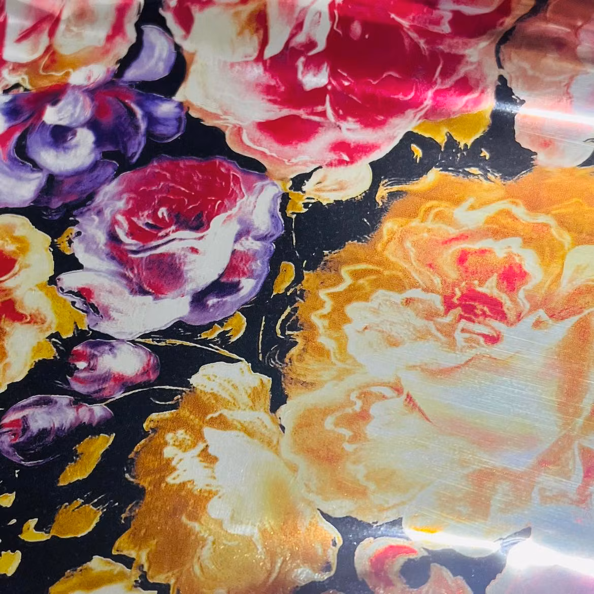 Hot stamping foil - Blommig med svart botten 200 - metervara