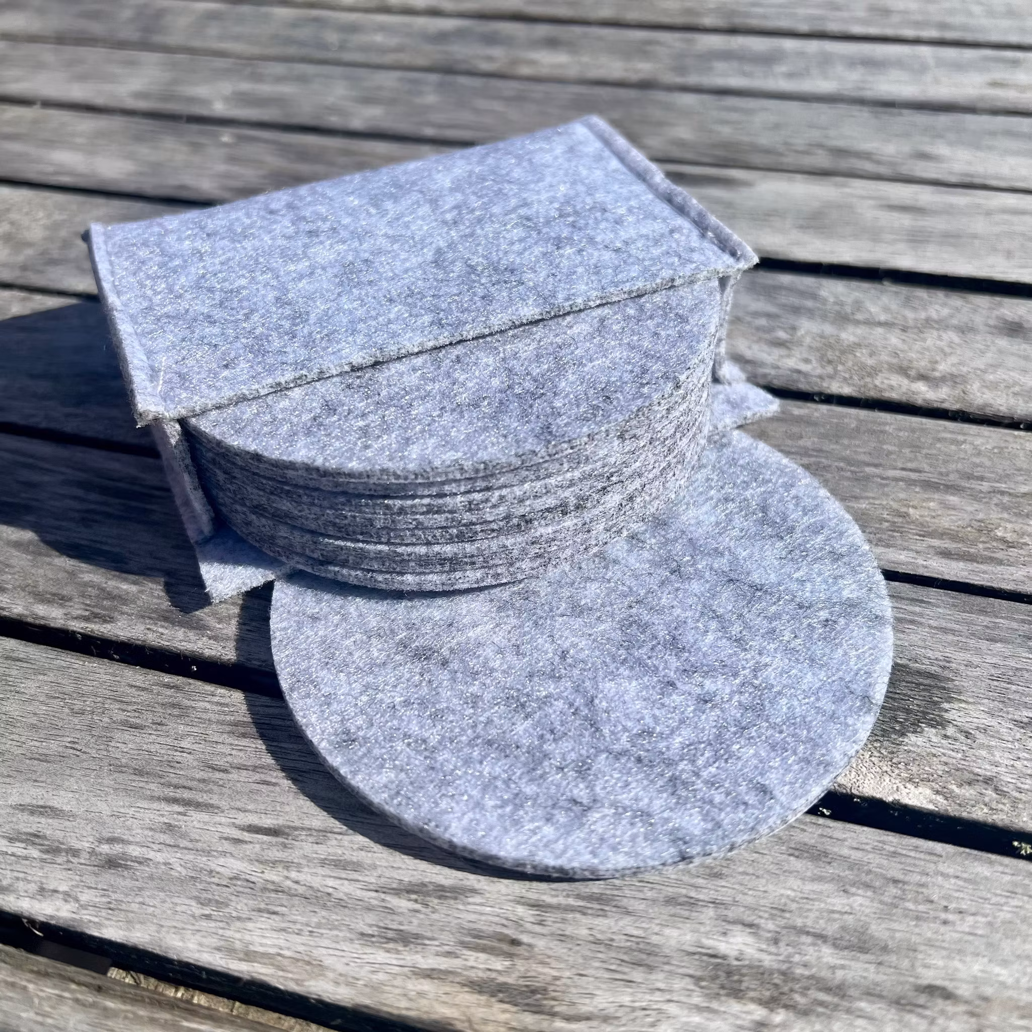 Glasunderlägg av filt