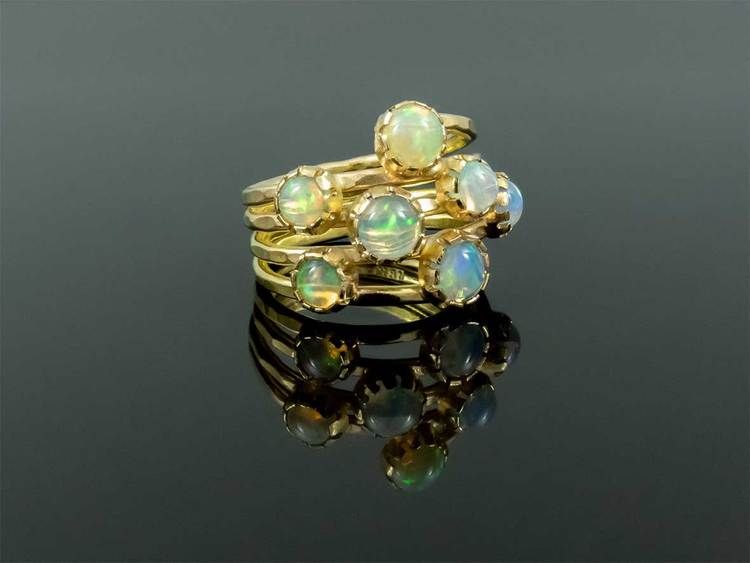 Gold ring with opals