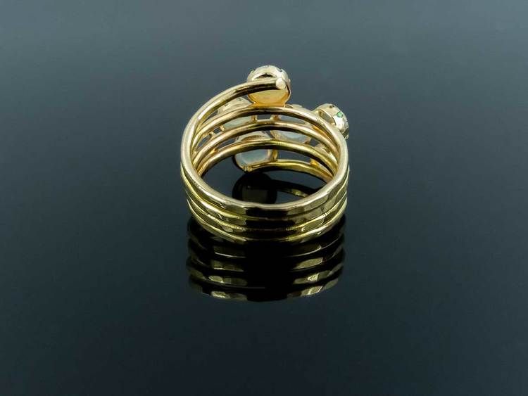 Gold ring with opals