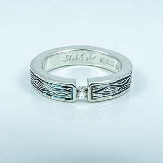 Flowing Bark silver ring with a White Sapphire