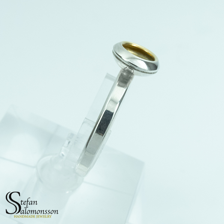 Silver ring with gold plating