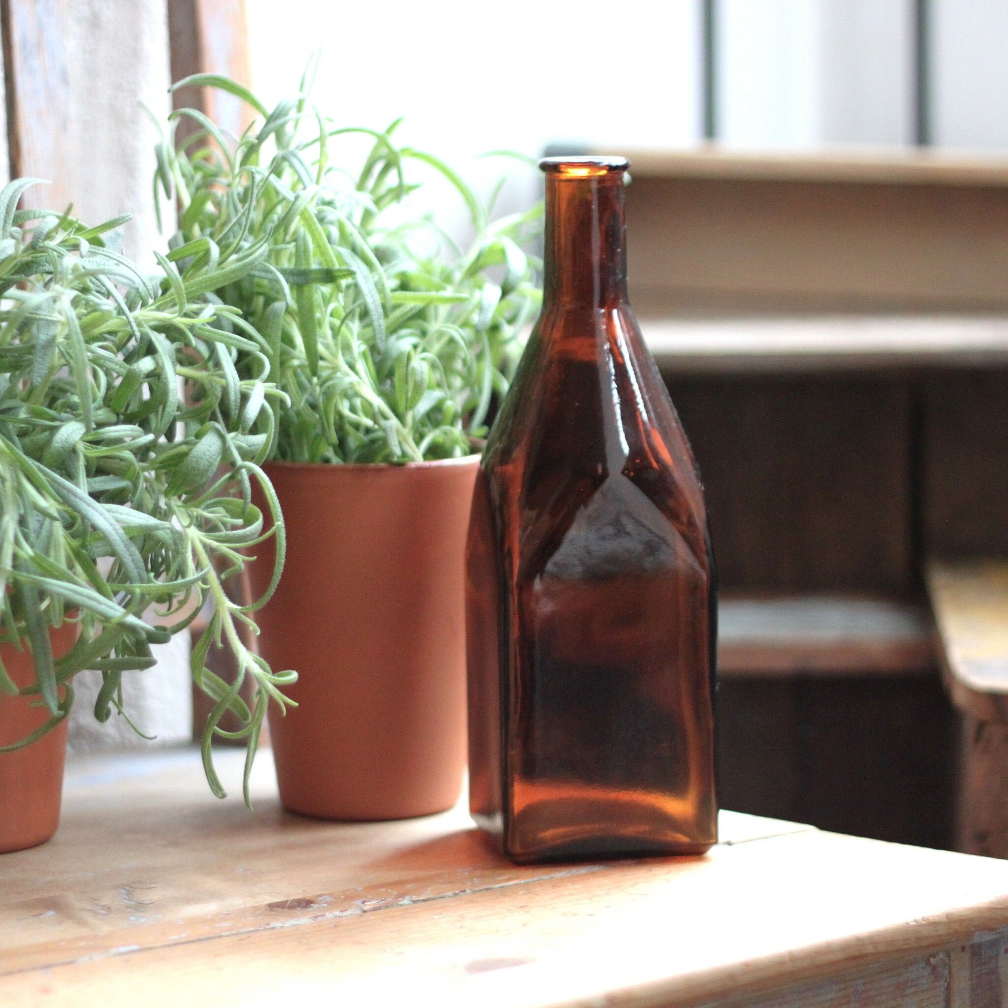 Flaska - Fyrkantig i Brunt Glas