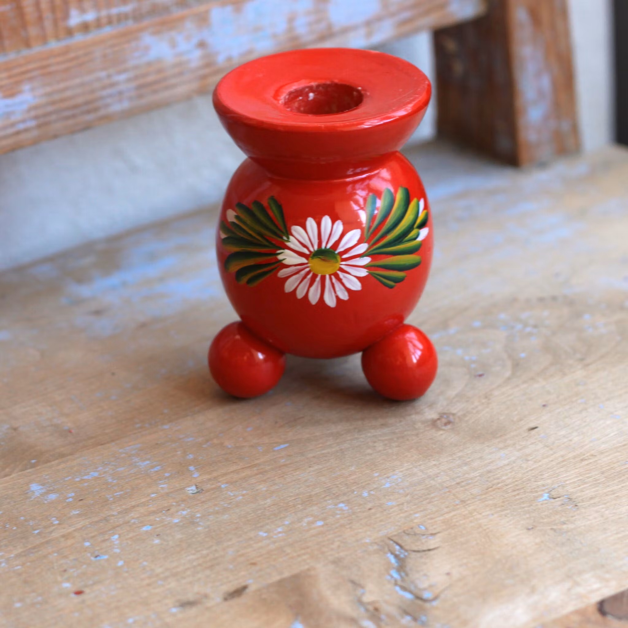 Ljusstake - Röd ljusstake med blomma