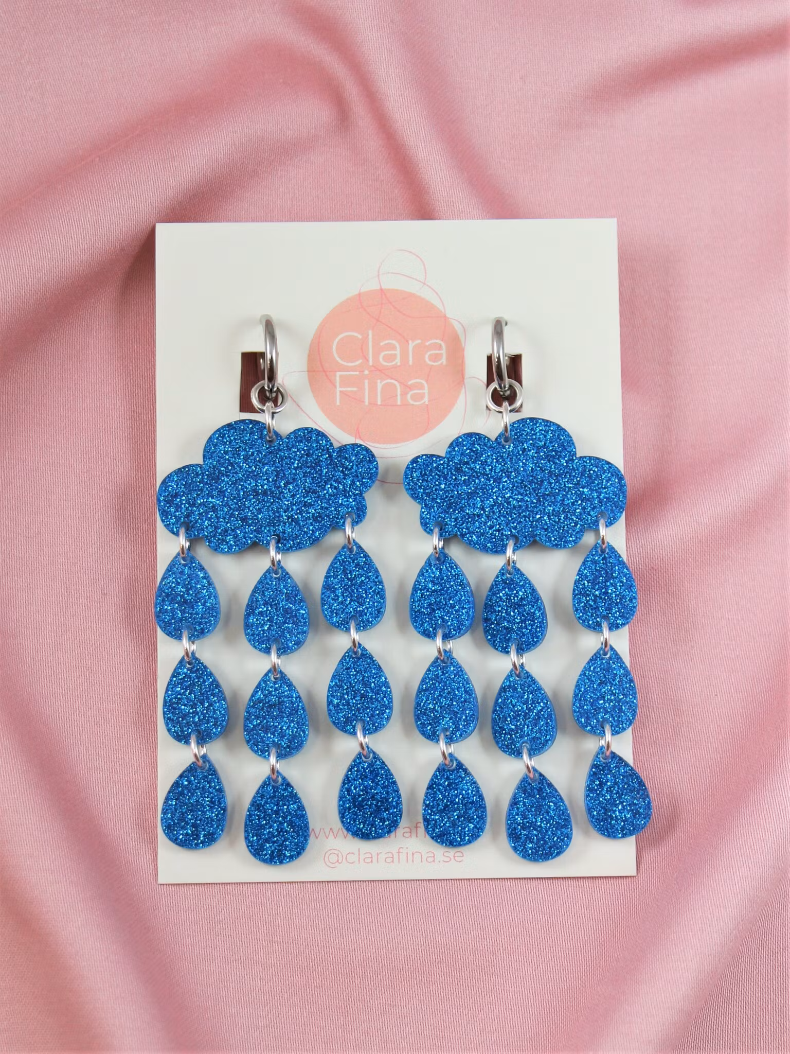 Ösregn blå glittermoln på ring