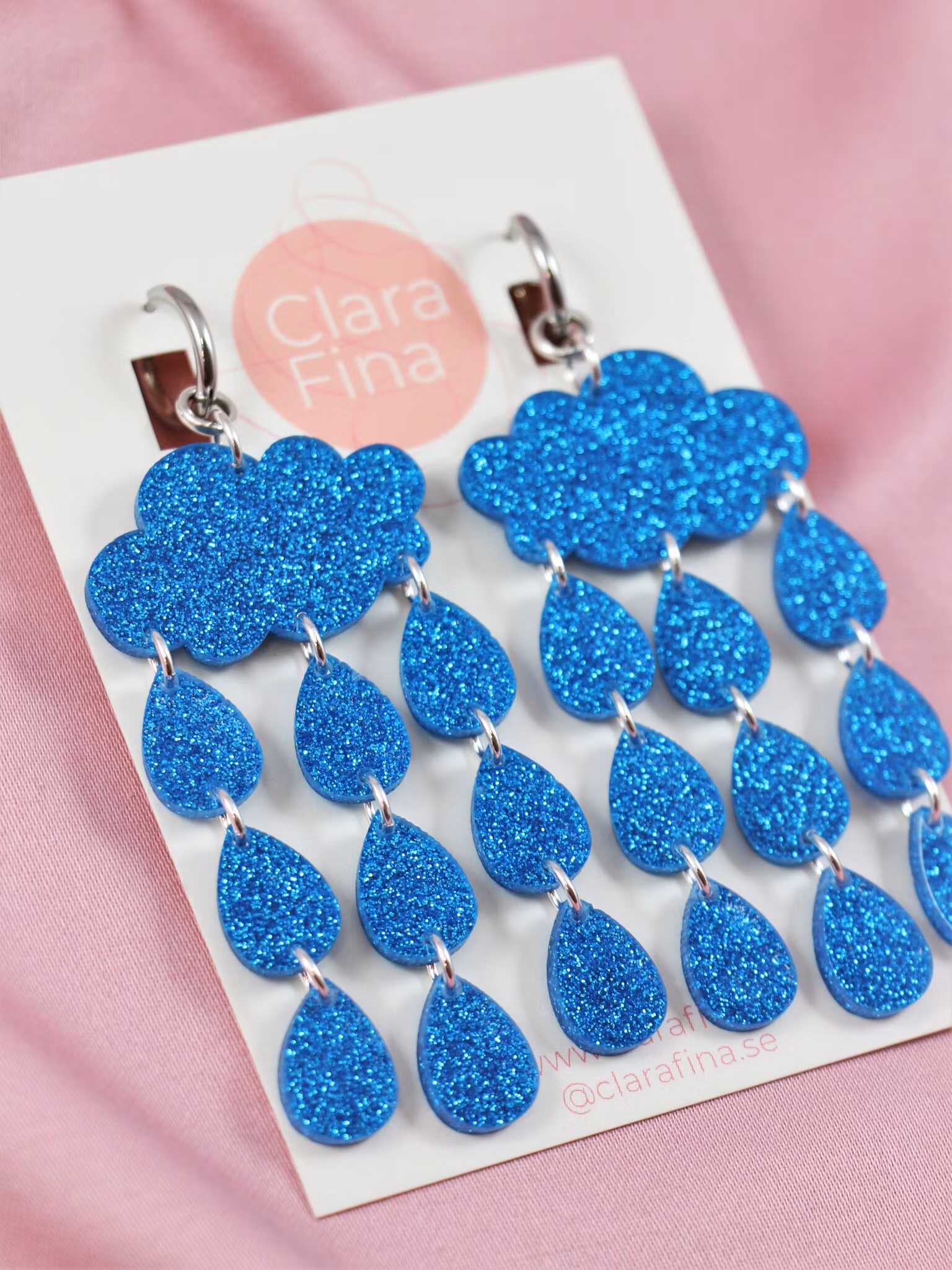 Ösregn blå glittermoln på ring