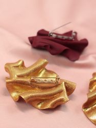 Brosch Satin Guldglitter Vänster