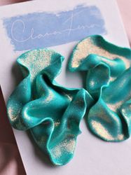 Satin blått glitter