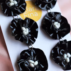 Elinor trippel svart