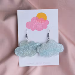 Blå skimrande glittermoln på krok