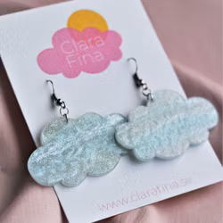 Blå skimrande glittermoln på krok