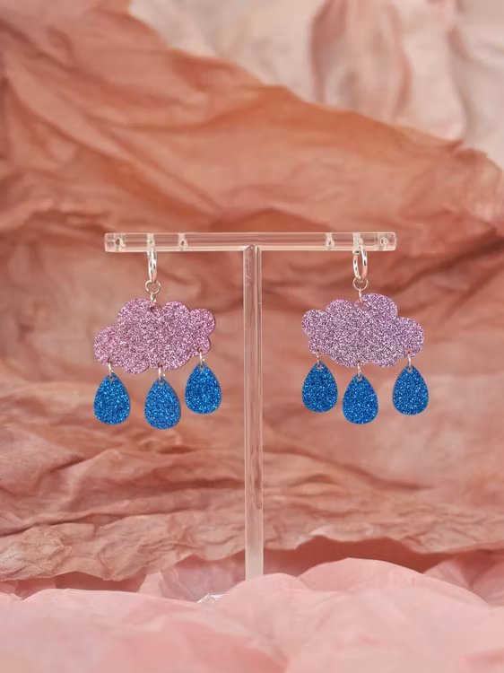 Små regnmoln på ring rosa glitter