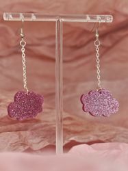 Små rosa glittermoln på krok i kedja