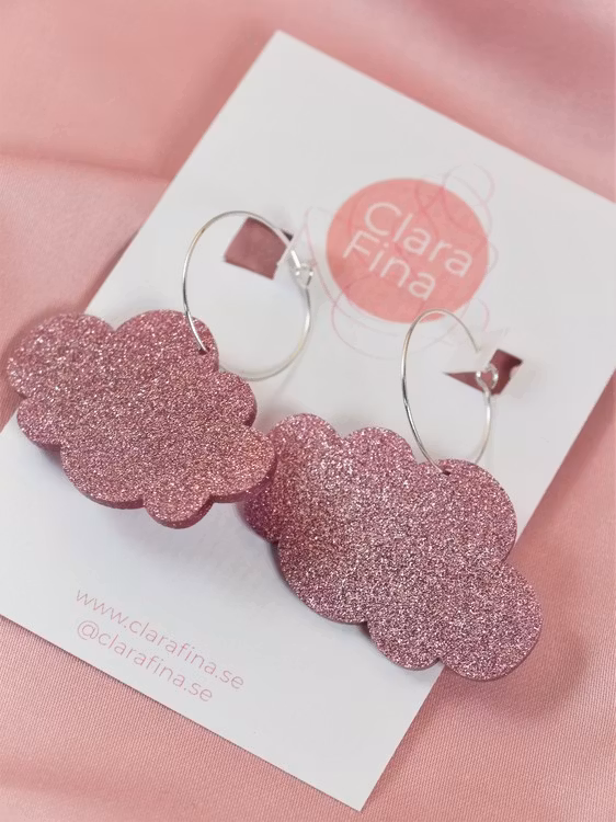 Rosa glittermoln på silvrig ring