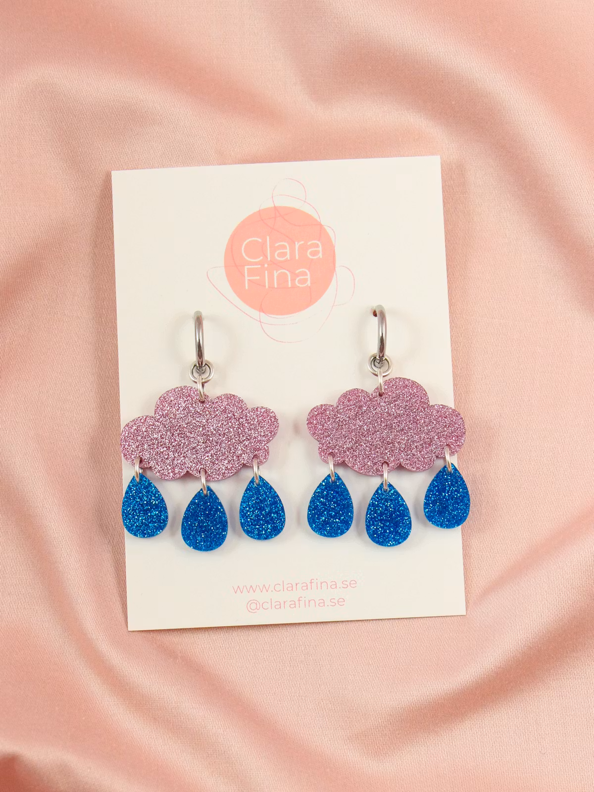 Små regnmoln på ring rosa glitter