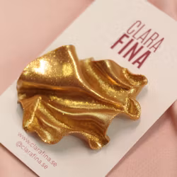 Brosch Satin Guldglitter Vänster