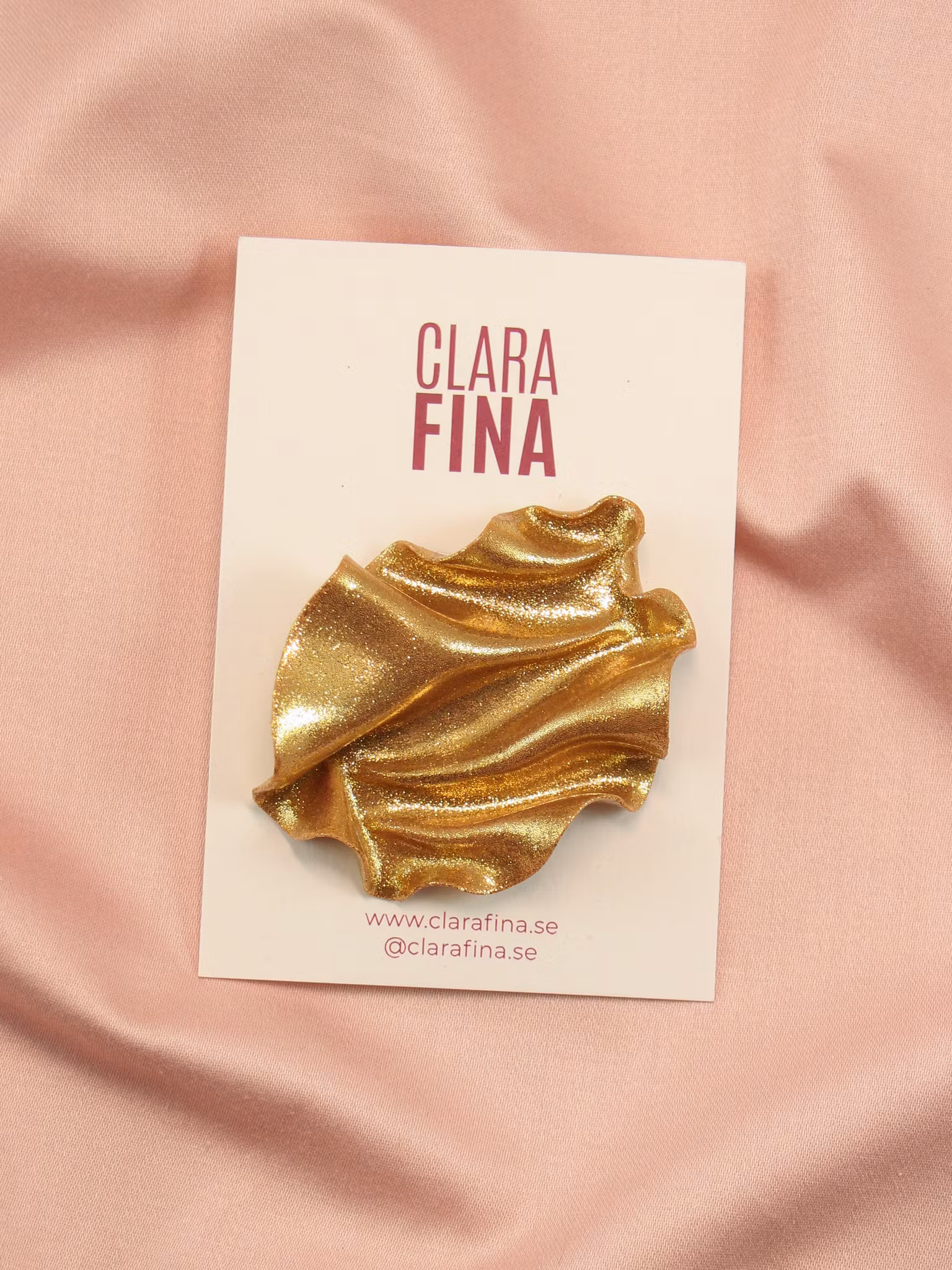 Brosch Satin Guldglitter Vänster