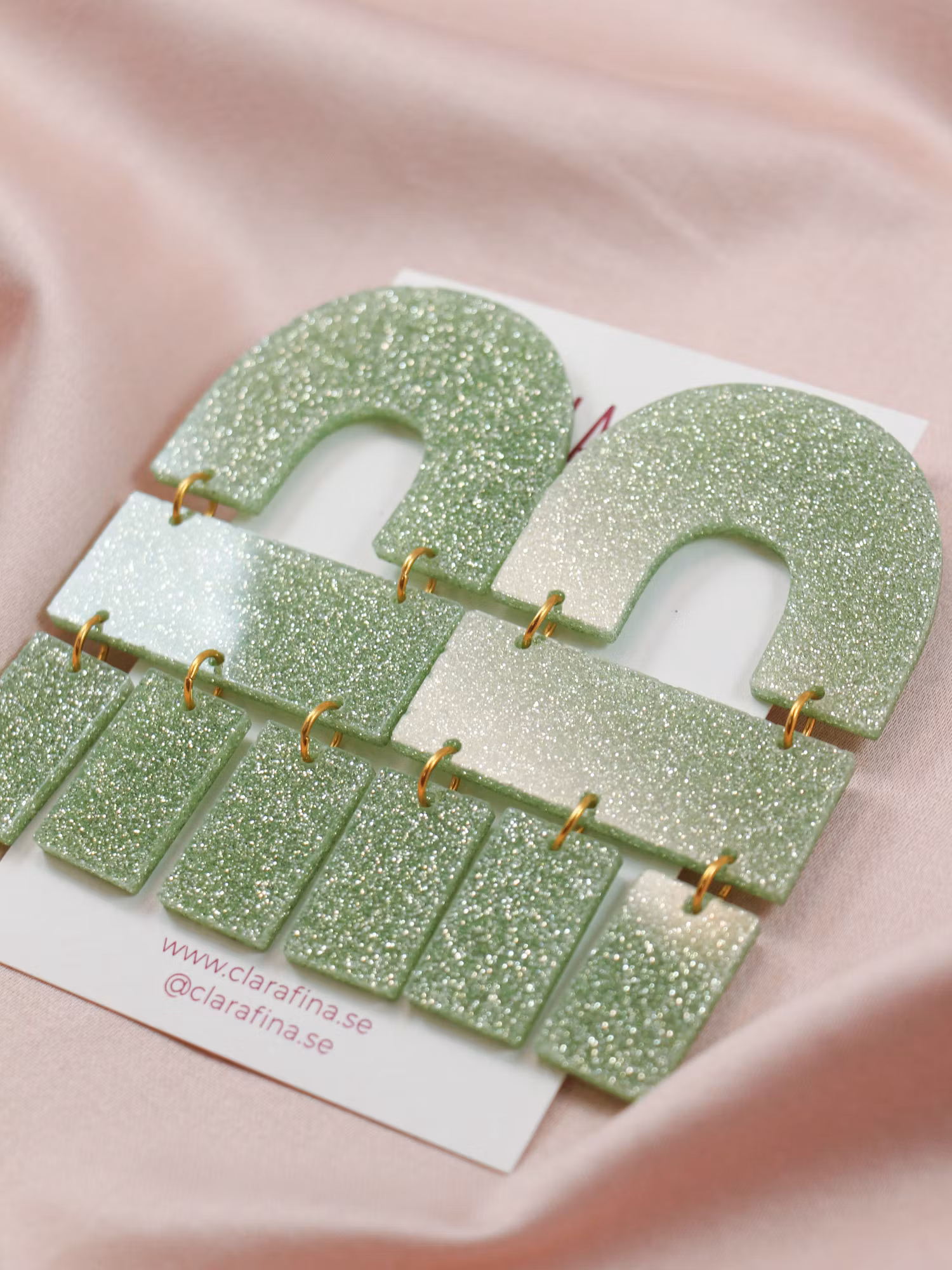 SAMPLE SOLBLEKT Multi Shape grönt glitter