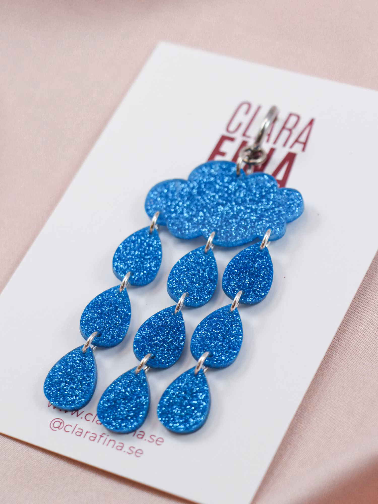 SAMPLE (SINGEL 1 st) Ösregn blå glittermoln på ring