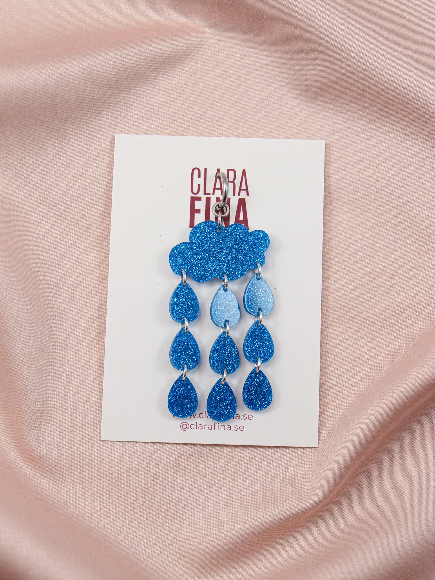 SAMPLE (SINGEL 1 st) Ösregn blå glittermoln på ring