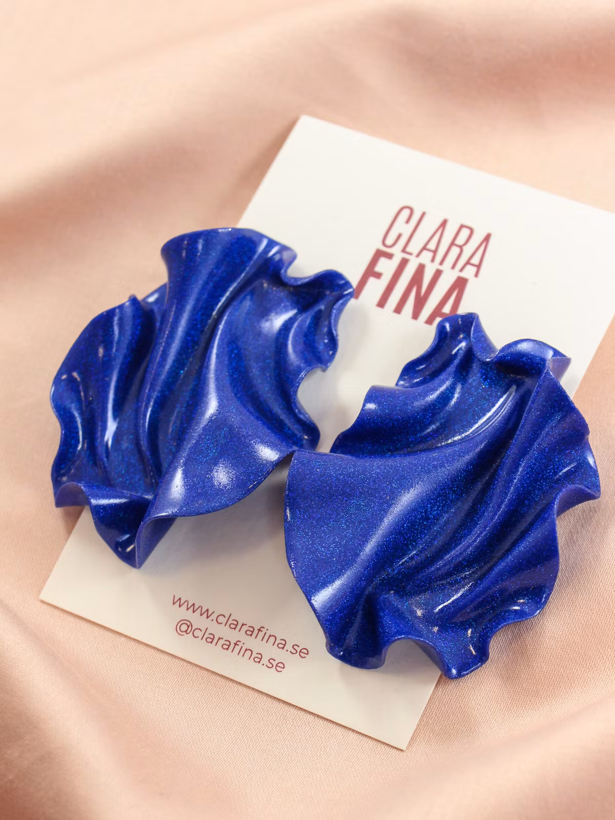 Satin blått glitter