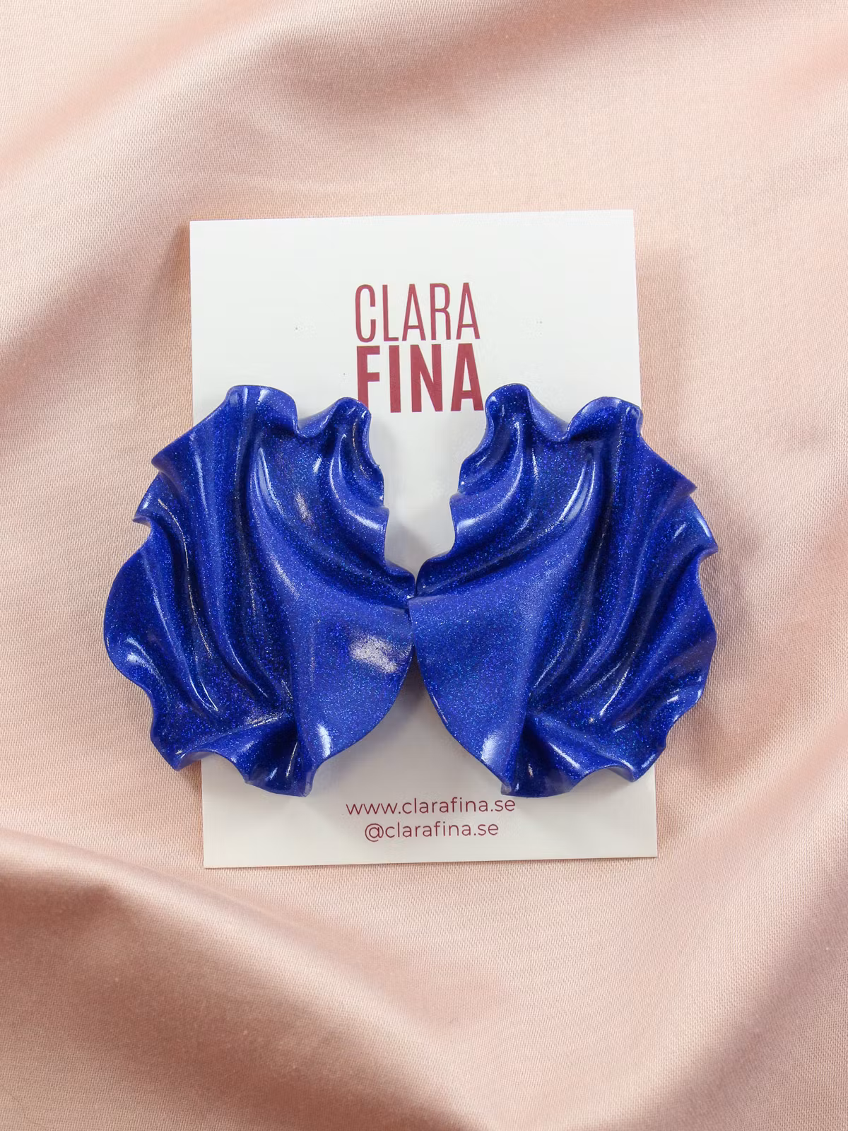 Satin blått glitter