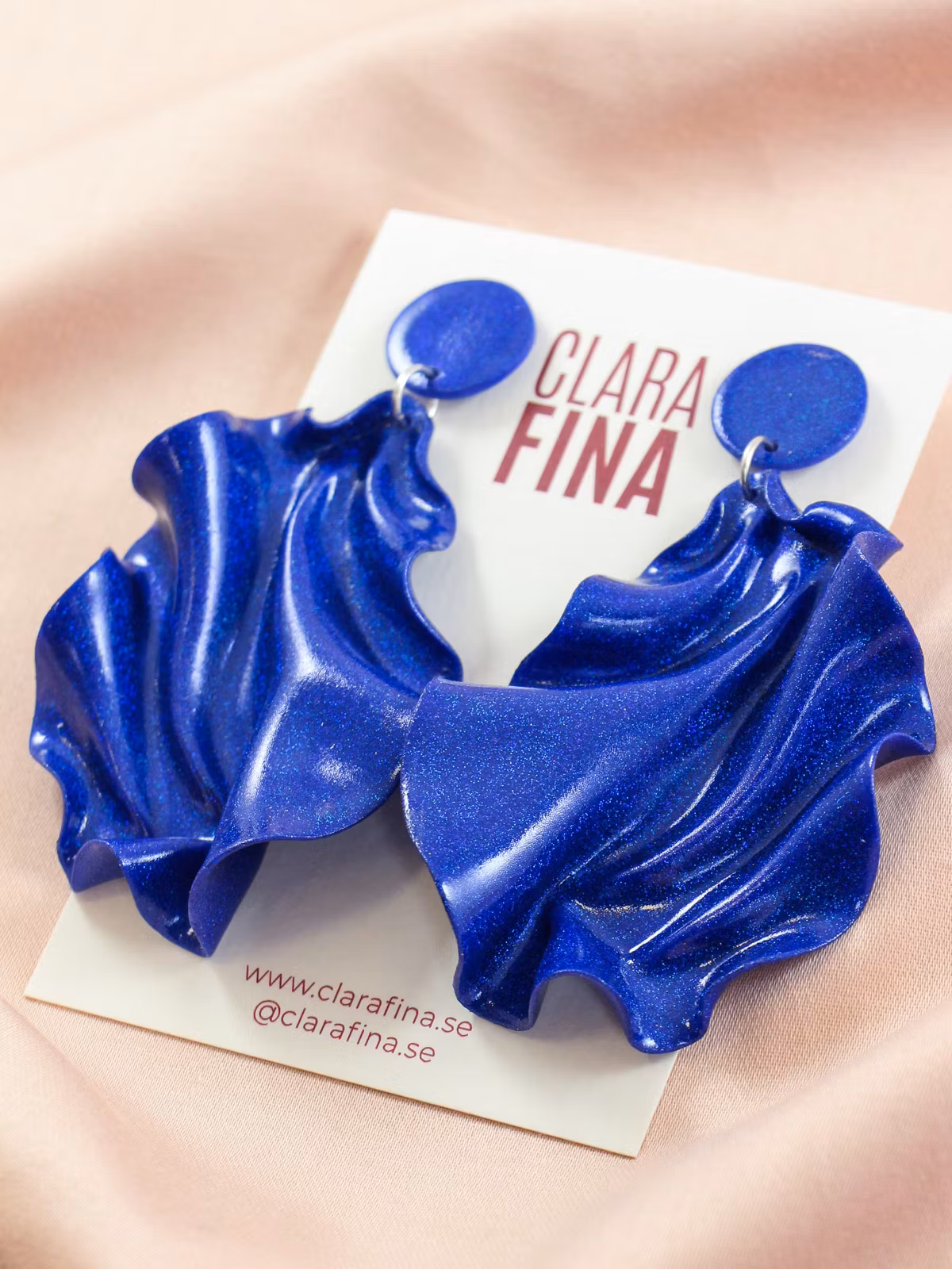 Satin round top blått glitter