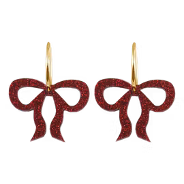 Stor röd rosett på guldig ring