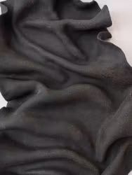 Väggskulptur svart/mörkbrun lera