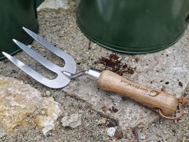 Handgrep med trähandtag