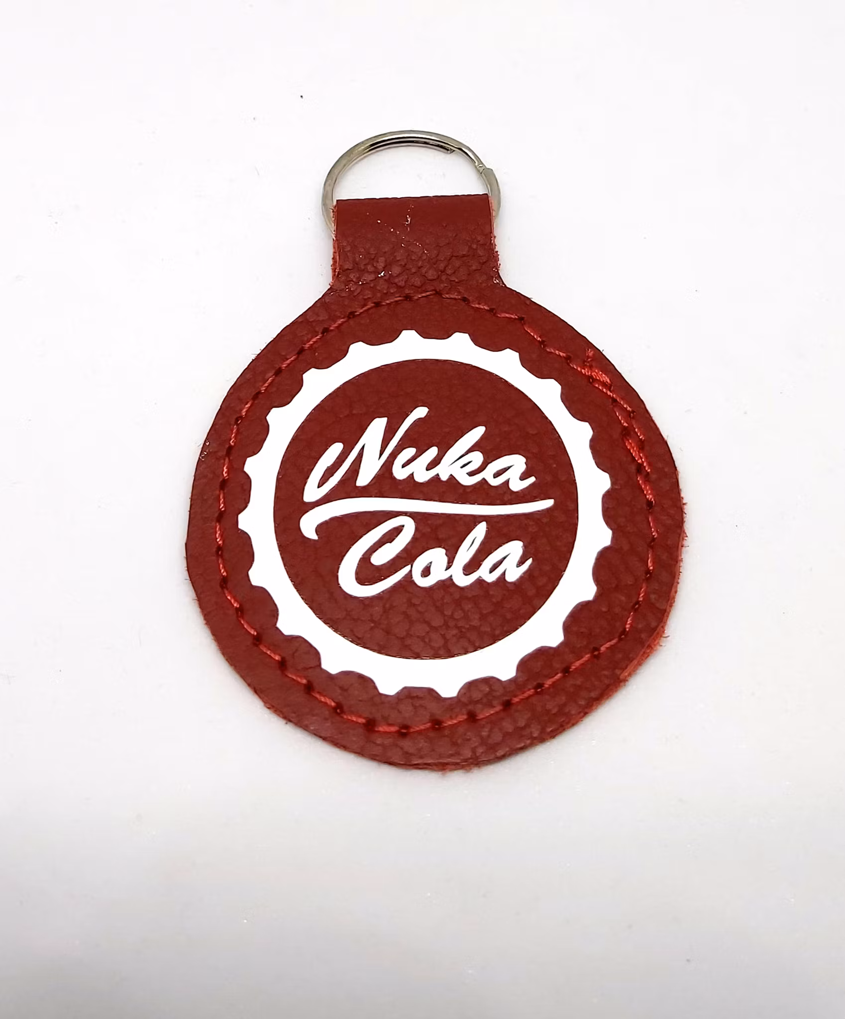 Tryckt nyckelring - Nuka Cola