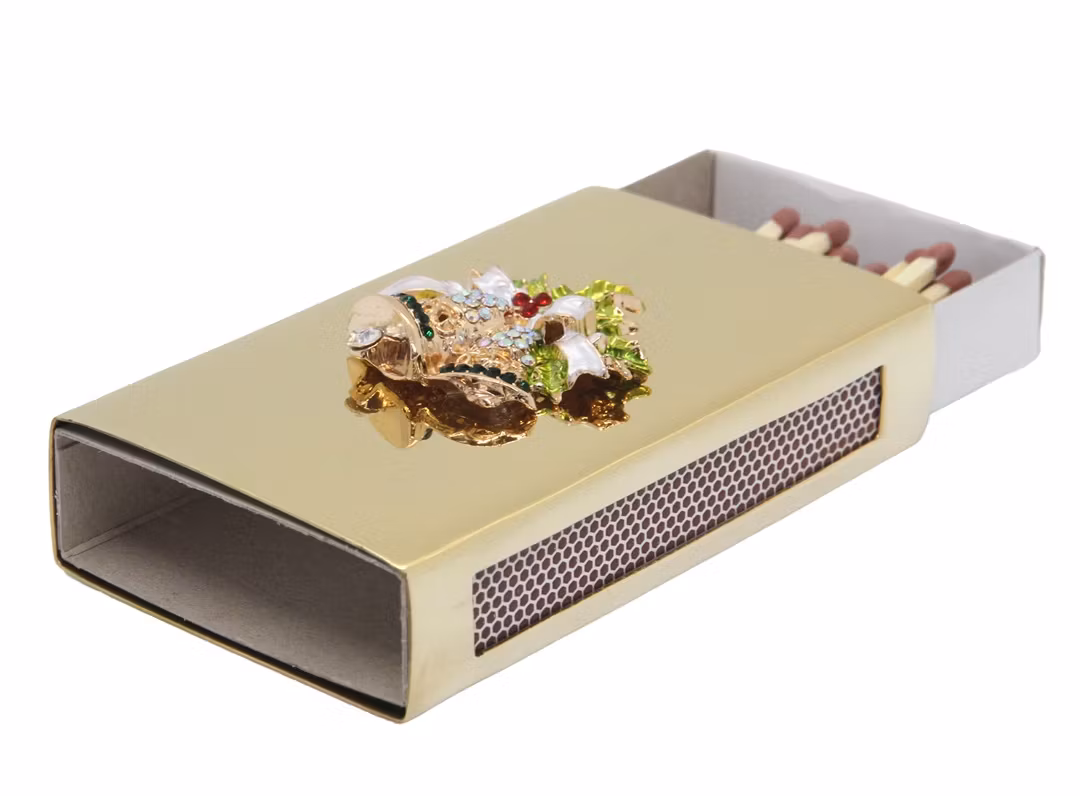 Tändsticksfodral i mässing med julklockor, från Gusums Messing