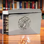 Medium size matchbox in nickel plated brass with lion mask