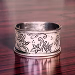 Flower, napkin ring in solid lead-free pewter, 4 cm wide and 5.5 cm long, from Munka Sweden