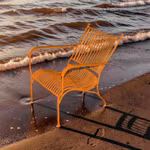 Lounge chair in forged iron, ORANGE from Mr Fredrik