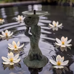 Underbar klassisk fontän med PUTTI som håller snäckskal och fat