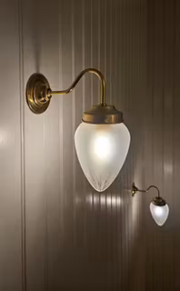 Vägglampa i mässing