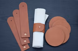 Set 4 servettringar och 4 glasunderlägg
