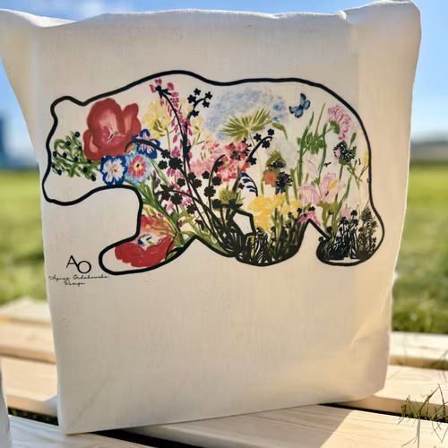 TYGPÅSE -BJÖRN MED BLOMMA