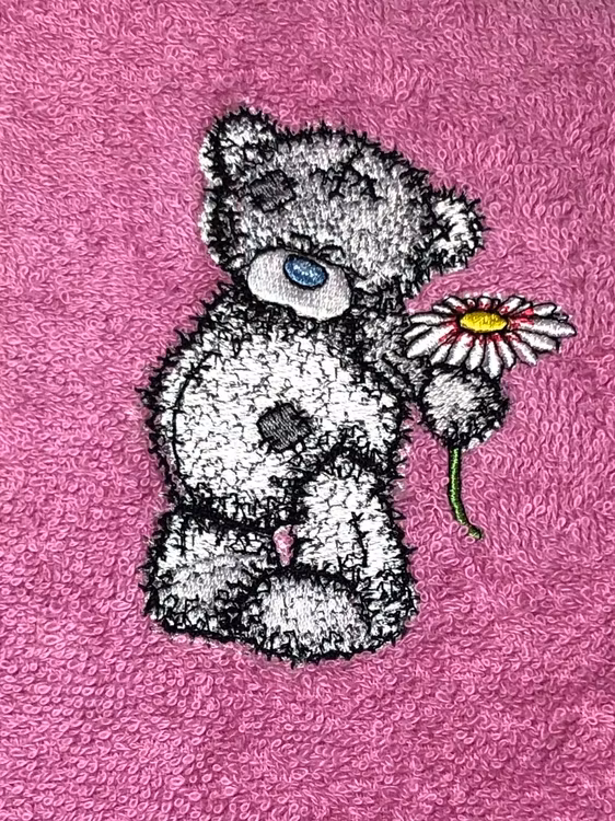 Nalle med blomma