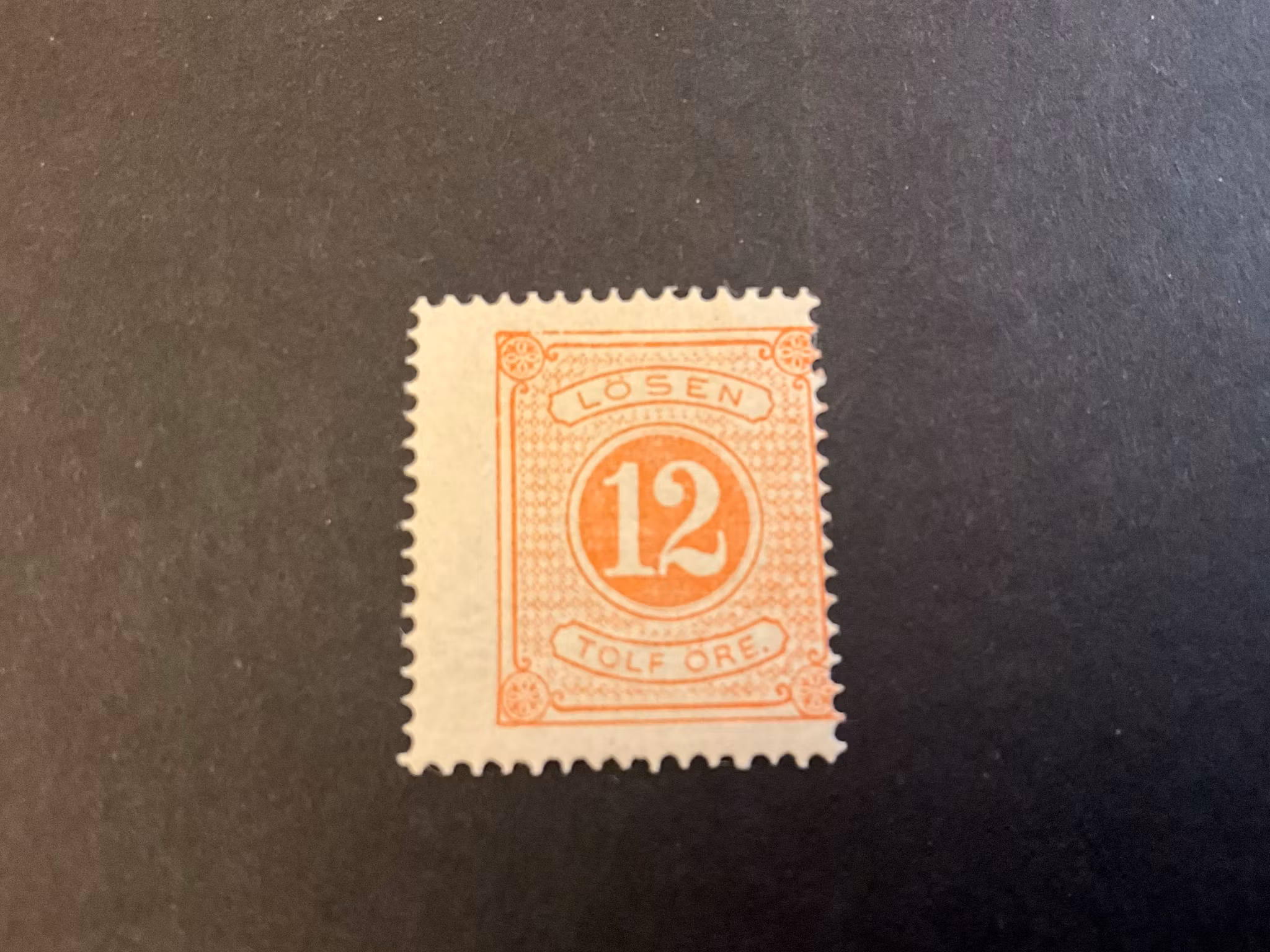 Lösen facit nr L5 ostämplat med brott i ytterramen, snedcentrerat