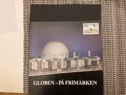 Folder Globen på frimärken med ett postfriskt häfte och stämplat block