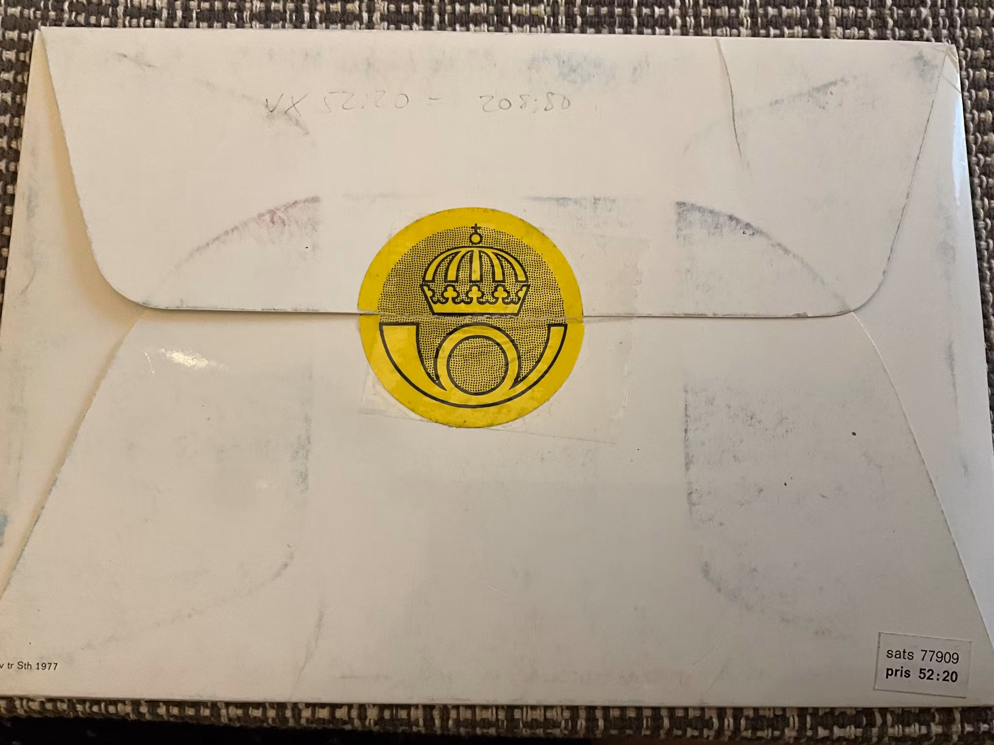 PFA, s årssts 1977, emblemet på baksidan lite öppnat men helt
