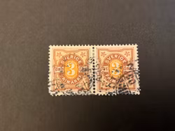 Tvåfärgad siffertyp stämplat par facit 63 med omvänd vattenmärke krona