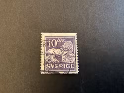 Stående lejon facit 145 E stämplat märke