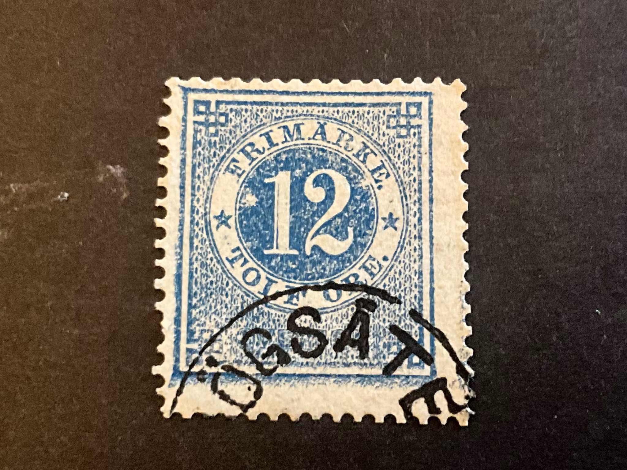 Ringtyp T 14 facit 21 med skuggad etta och utflutet tryck understa ramen