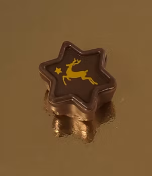 Motiv av en ren med Marc de champagne fyllning