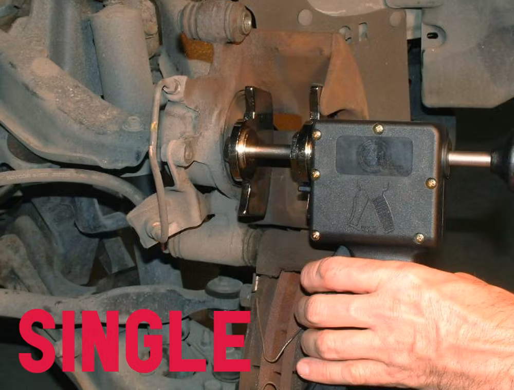 Universal brake piston spreader