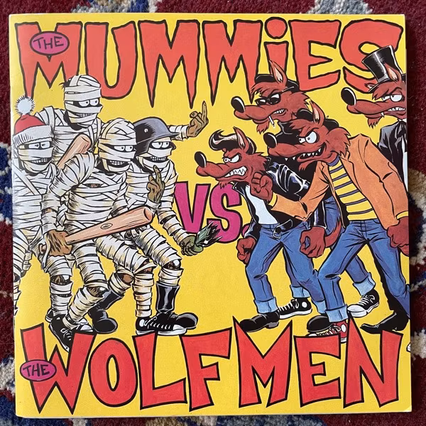 MUMMIES, the VS THE WOLFMEN The Mummies Vs. The Wolfmen (Sympathy For the Record Industry - USA 2nd press) (EX) 2x7"