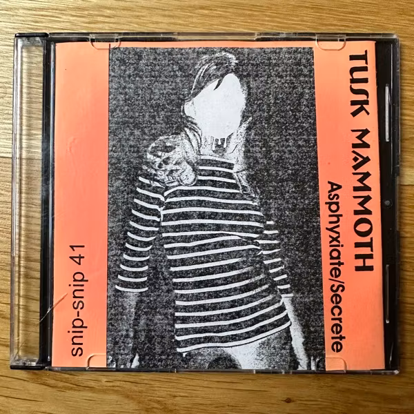 TUSK MAMMOTH Asphyxiate/Secrete (Snip-Snip - USA original) (EX) CDR